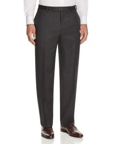 A wardrobe staple from Canali, these crisply creased wool trousers form a solid foundation for polished workweek style. Wool Flat Front Bottoms For Workwear, Tailored Wool Bottoms For Office Wear, Wool Flat Front Bottoms For Business Casual, Formal Wool Pants For Fall, Timeless Wool Dress Pants For Business Casual, Classic Work Pants With Welt Pockets For Fall, Classic Wool Bottoms For Business Casual, Classic Flat Front Pants For Fall, Formal Wool Pants With Pockets