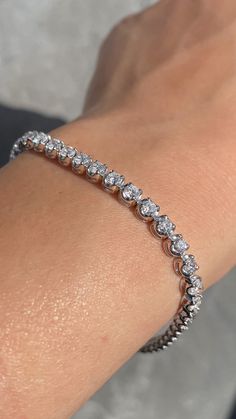 Up for sale is a Beautiful 14K Diamond Tennis Bracelet Prong Set *All specifications are for 7 Inches Specifications: -Model #: 6998 -Size of Diamonds: 2.8 MM -Width of Bracelet: 4 MM -Height of Bracelet: 2.8 MM -Gold Weight: 8.8 Grams -Total Diamond Weight: 45 Round 4.00 Carats -Color: F -Clarity: SI *18K GOLD & PLATINUM ALSO AVAILABLE WITH ADDITIONAL COST CUSTOM MADE TO ORDER Brief Overview: -30 Day Return Policy -Conflict Free Diamonds -Satisfaction Guarantee -Box Included With Purchase. Tennis Bracelet Diamond For Women, White Stone Bracelet, Hockey Wife, Classic Jewelry Pieces, Diamond Bracelet Design, Mens Silver Jewelry, Basket Setting, Diamond Tennis Bracelet, White Gold Bracelet