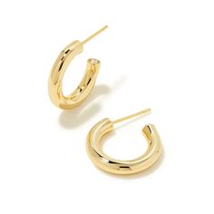 Pictured is a pair of gold hoop earrings on a white background. Huggie Earring, Wedding Day Jewelry, Giddy Up Glamour, Engagement Ring Guide, Metal Shop, Earrings In Gold, Huggie Earrings, Ring Size Guide, Huggies Earrings