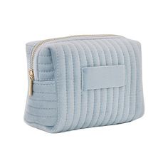 a small blue cosmetic bag on a white background