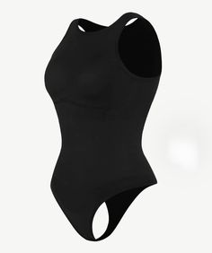 Introducing our "Curve-Contouring Halter Bodysuit" – a fashion-forward masterpiece designed to effortlessly sculpt your curves. This sleek shapewear bodysuit provides gentle compression for a refined, flawless appearance that accentuates your innate allure. Its versatile adjustable halter top and comfortable fit make it your ultimate fashion companion, ensuring you radiate confidence and elegance wherever life takes you. Product Details: Eco-Friendly Blend: 50% Recycled Nylon, 40% Nylon, 10% Spa High Stretch Smoothing One-piece Bodysuit, Solid Compressive One-piece Bodysuit, Elegant High Stretch Seamless Shapewear, Solid Color One-piece Shapewear Leotard, Fitted Solid Shapewear With Built-in Bra, Seamless High Stretch One-piece Bodysuit, Elegant High Stretch Bodysuit With Built-in Bra, Elegant Fitted Shapewear With Medium Bust Support, High Stretch One-piece Bodysuit With Lined Body