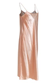 Is there anything more simple and sleek than a slip dress? Go precious in pastel with this romantic beauty from Vince! Created in an ethereal peachy hue on oh-so-soft satin, this majestic maxi is the perfect light and airy piece for all your warm weather excursions! Pair with strappy sandals and a wide brim hat for a backyard get-together, or get a little glitzy with sparkly pumps and statement earrings for your next outdoor wedding. No matter where or how you rock this frock, you're sure to be Sleeveless Party Dress With Subtle Sheen, Sleeveless Dress With Subtle Sheen For Party, Chic Sleeveless Dress With Subtle Sheen, Chic Slip Dress With Subtle Sheen For Party, Sleek Dresses With Subtle Sheen For Party, Chic Slip Dress With Subtle Sheen For Evening, Feminine Sleeveless Bias Cut Satin Dress, Pink Satin Dress With Spaghetti Straps For Spring, Pink Bias Cut Slip Dress For Spring