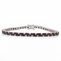 This is a classic style tennis bracelet. A must-have statement piece for every woman. It's a classic luxury to have. A perfect gift for your loved ones. -Material - 14K Solid White Gold -Gemstone - Genuine Black Diamonds -Diamond Weight - 1.050 ct - Black Diamond Weight - 2.550 Ct -Gross weight - 10.40 grams Diamond is the gemstone for those who are born under Virgo and Libra as it bestows good luck and prosperity. Other zodiac signs can wear the diamond at certain times and under certain condit Black Diamond Bracelet, Blue Sapphire Studs, Bracelet Christmas, Bracelet Diamond, Gold Armband, Birthstone Bracelet, Diamond Tennis Bracelet, April Birthstone, White Gold Bracelet