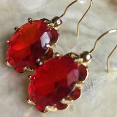 Listing Is For A Pair Of Earrings With The Gemstone: Ruby. Each Stone Is Approx 7.5 Carats. It Is Translucent, Bright, And Beautiful. The Size Is 18x13. The Gemstones Are Natural, And Originates In Mozambique. Other Features: Optic Character: Dr Refractive Index: 1.77 Specific Gravity: 3.99 These Ruby Are Certified. They Are Un-Enhanced And All Natural. Please Review Photos For Style, Measurements, And Color. Ask Questions Prior To Purchase, As There Are No Returns. This 14k Gold Filled Drop Dow Red Oval Earrings For Formal Occasions, Formal Red Oval Earrings, Classic Red Ruby Earrings, Classic Ruby Red Earrings, Red Crystal Drop Earrings For Pierced Ears, Red Crystal Earrings For Anniversary, Red Pierced Earrings For Formal Occasions, Red Formal Pierced Earrings, Classic Red Earrings For Evening