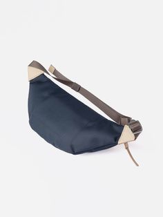 This water-resistant and functional bum bag from Sandqvist is constructed from 100% recycled polyester with leather patch details. The functional and versatile features and heritage leather patch details makes this bag a modern classic to pair with O.N.S clothing. Capacity 1.5 L Main compartment: W 35 x H 16 x D 7 cm One outside zipper pocket One inner slip pocket YKK® zipper Adjustable shoulder strap Bum Bag, Ykk Zipper, Band Collar, Black Cross Body Bag, Leather Patches, Small Leather Goods, Steel Blue, Jewelry Bags, Sock Shoes