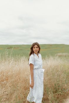 Beautiful Structured dress in a french linen fabric. Lined with shell buttons. Features front pockets and side slits on both legs. Such an easy breezy throw on and go piece for summer. Sizing Details: One size. Fits most comfortably between US sizes 2-10 Care Instructions: Gentle wash on cold and hang to dry. A steam is the best way to get wrinkles out of your linen. Short Sleeve Linen Dress With Buttons For Day Out, Breezy Linen Midi Dress For Daywear, Breezy Knee-length Midi Dress For Daywear, Relaxed Fit Midi Linen Dress For Daywear, Breezy Short Sleeve Dresses For Daywear, Spring Linen Dress With Buttons For Vacation, Breezy Short Sleeve Midi Dress For Garden Party, Spring Vacation Linen Dress With Buttons, Casual Linen Midi Dress For Day Out