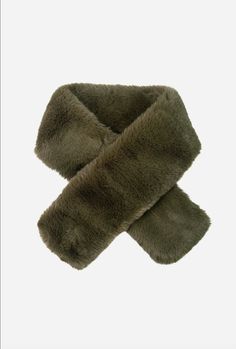 Khaki Short Tuck Through Faux Fur. A beautiful super soft black short pile, this faux fur is the softest faux fur imaginable. This classic faux fur scarf is a must for your wardrobe, perfect for the cold weather. Khaki. One Size. 92cm x 11cm Solid Faux Fur Coat For Cold Weather, Solid Color Faux Fur Coat For Cold Weather, Faux Fur Coat For Cold Weather, Color Caqui, Faux Fur Scarf, Faux Fur Wrap, Faux Fur Scarves, Fur Wrap, Cashmere Gloves