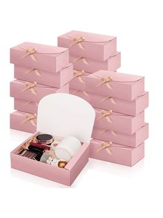 six pink boxes with various items inside them