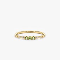 It’s always a good idea to rock your birthstone!This delicate piece features a petite peridot and diamond set in a dainty band, perfect for stacking with other rings or wearing alone for a subtle touch of elegance. Total Peridot Carat Weight: 0.09 ctw Total Diamond Carat Weight: 0.05 ctw Birthstone Engagement Rings, Stacked Diamond Bands, Amethyst And Citrine, Stacked Wedding Rings, Multiple Rings, Dainty Band, Peridot Jewelry, Diamond Birthstone, Charm Pendant Necklace