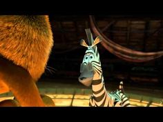 an animated zebra standing next to a giraffe in a room with other animals