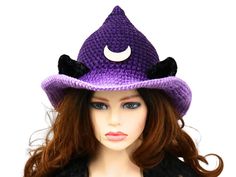 This ombre casual witch hat with velvet cat ears is so fun to wear! Ready to ship and will add the perfect touch for an event, a costume, a renfaire festival, or just for witchy fun. I made this in a gradient purple that ombres from dark at the tip to lilac at the brim edge. The velvet cat ears can be pinched to be more pointy or tapped to be a softer point. A lunar wooden crescent moon graces the front. The brim is wired for shaping so you can get the perfect look. Firm enough to stand on its own, soft to wear, and full of character. This hat has some stretch and will fit between 21" to 23.5" head circumferences. Folds flat for travel. How to measure your head: - Using a fabric tape measure or a string, place it flat against your head, and measure around the area directly above your ears. Novelty Brimmed Halloween Hat, Novelty Brimmed Hat For Halloween, Gothic Brimmed Winter Hats, Adjustable Cat Ears Headpiece For Halloween, Witchy Hat With Curved Brim For Winter, Adjustable Cat Ears Costume Hat For Halloween, Witchy Winter Hat With Curved Brim, Purple Hats For Halloween Costume Party, Witchy Curved Brim Winter Hat