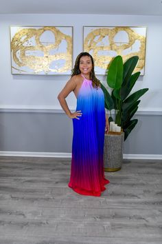 This halter maxi dress features a striking combination of royal blue and magenta hues, creating a vibrant and eye-catching look. The halter neckline adds a touch of elegance, while the flowing silhouette ensures comfort and movement. Perfect for making a statement at any special occasion or summer event. Oversized Model is wearing a small with plenty of room left 100% Polyester Model wearing a small Floor-length Halter Dress For Night Out In Summer, Floor-length Halter Dress For Summer Nights, Pink Flowy Halter Neck Dress, Purple Floor-length Maxi Dress For Night Out, Flowy Halter Maxi Dress For Evening, Purple Maxi Dress For Party, Vibrant Summer Party Maxi Dress, Summer Party Vibrant Maxi Dress, Vibrant Halter Neck Party Dress