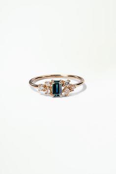 14k solid recycled gold Bi-color gradient sapphire, emerald cut, 5x3mm, 0.34ct approx, Montana or Australia originThe stone in the photo is the actual stone you will receiveDiamonds 0.16 total carat weight, reclaimedBand width 1.3mm round | Emerald Cut Sapphire and Diamond Mosaic Ring No. 38 Size 3mm | WWAKE Futures Mosaic Ring, Diamond Mosaic, Montana Sapphire, Ring Sizer, Recycled Gold, Gradient Color, Emerald Cut, Montana, Emerald