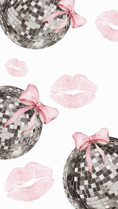 a pattern with lips and lipstick on it, as well as a mirror ball that has pink ribbon around the mouth