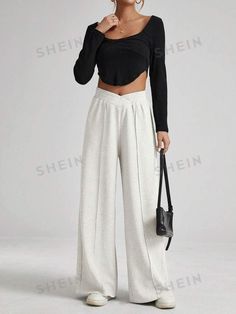 Details:Asymmetrical \nStyle:Casual \nClosure Type:Elastic Waist \nColor:Beige \nPattern Type:Plain \nType:Wide Leg \nWaist Line:Ultra High Waist \nLength:Long \nFit Type:Loose \nFabric:Slight Stretch \nMaterial:Knitted Fabric \nComposition:98% Polyester \nComposition:2% Elastane \nCare Instructions:Machine wash or professional dry clean \nTemperature:Late Fall (10-17℃/50-63℉) \nBody:Unlined \nSheer:No \n Plush Pants, Fits Streetwear, Trendy Pants, Elastic Pants, Late Fall, Loose Pants, Toothpick, Knitted Fabric, Womens Bottoms