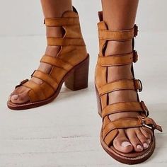 Boho And Edgy Meet With These Chic Gladiator-Look Heels, Featured In A Multi-Strap Design With Buckle Details And A Stacked Wooden Block Heel. Brand New W/Out Tag; Original Box Not Included *Slip-On Style *Strappy Design *Round Open Toe *Full Ankle Bracing W/Pull Tab *Adjustable Buckles *Lined, Cushioned Footbed *Leather Upper, Insole & Sole *Stacked Wooden Block Heel *Rubber Heel Cap *India Size: 38.5 / 8.5 Size: 39 / 9 Approximate Heel Height: 3.5" Approximate Shaft: 5.75" Product Label Has A Brown Leather Sole Sandals For Fall, Ankle-high Brown Sandals For Fall, Brown Ankle Strap Sandals For Fall, Brown Ankle-high Sandals For Fall, Leather Ankle-high Sandals With Stacked Heel, Ankle-high Leather Sandals For Fall, Brown Ankle Strap Heels With Leather Footbed, Open Toe Sandals With Leather Sole For Fall, Leather Sole Open Toe Sandals For Fall