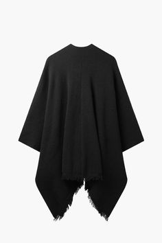 THE PONCHO is Our Iconic Western style Poncho featuring a Jacquard knit in Black and finished with a 4inch tonal fringe. Poncho Jacket, Denim Accessories, Knit Sleeve, Fleetwood Mac, Jacquard Knit, Clothes Collection, Vest Top, Black Knit, Western Style