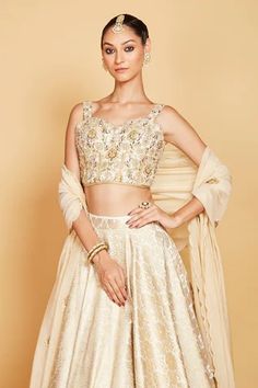 Shop for Amrin khan Gold Floral Corset Blouse And Lehenga Set for Women Online at Aza Fashions Festive Raw Silk Unstitched Blouse Set, Festive Unstitched Raw Silk Blouse Set, Fitted Art Silk Palazzo Set For Reception, Fitted Raw Silk Palazzo Set For Wedding, Festive Raw Silk Sets With Unstitched Blouse, Festive Unstitched Blouse Palazzo Set For Reception, Festive Palazzo Set With Unstitched Blouse For Reception, Festive Palazzo Set For Reception With Unstitched Blouse, Festive Sleeveless Sets With Sheer Dupatta