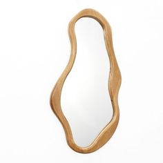 an oval wooden mirror on a white background with the reflection of it's curved shape