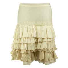 A Chloé pearl white skirt from the mid-2000s adorned in tiered ruffles from the hip down. The skirt is mid-thigh length fastened with a zip along the centre back. Fitted Cream Bottoms With Ruffles, Cream Ruffled Tiered Mini Skirt, Cream Tiered Ruffled Mini Skirt, Cream Ruffled Voluminous Skirt, Voluminous Cream Ruffled Skirt, Cream Ruffled Skirted Bottoms, Elegant Tiered Ruffle Mini Skirt, Fitted Beige Mini Skirt With Ruffles, Fitted Beige Skirt With Ruffles