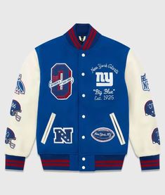 New York Giants OVO Varsity Full-Snap Wool and Leather Jacket Winter Varsity Jacket With Padded Collar, Winter Varsity Jacket With Padded Collar And Long Sleeves, Blue Varsity Jacket With Patchwork, Blue Patchwork Varsity Jacket, Casual Wool Varsity Jacket With Long Sleeves, Casual Long Sleeve Wool Varsity Jacket, Collegiate Blue Varsity Jacket For Fall, Blue Ribbed Collar Outerwear For Work, Collegiate Blue Long Sleeve Outerwear