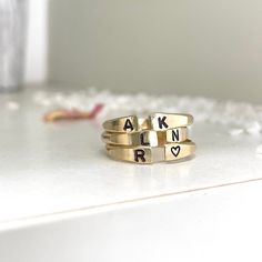 Our Personalized Open Cuff Ring might be small but it makes a mighty statement. This gorgeous minimalist style ring is perfect for stacking two, three, even four or layering with other ring styles. The fact that you can personalize it with initials and other designs just make it even better or leave it blank, it's totally up to you. Besides initials, this piece can be personalized with numbers, hearts, stars,s or flower symbols. This ring is hand-made and stamped in our studio at the time of order, of heavy 10 gauge 14kt gold filled metal wire. It's about 2mm thick and has an organic shape that is created by working the metal. This ring is 100% 14kt gold-filled, it is very durable and will wear very well with appropriate care, it will not change color or discolor your skin. I promise you'r Gold Stackable Rings With Initials For Everyday, Everyday Gold Stackable Rings With Initials, Everyday Open Ring With Initials, Minimalist Engraved Open Ring With Initials, Adjustable Initials Stackable Rings For Everyday, Simple Stackable Initial Ring For Everyday, Everyday Adjustable Stackable Rings With Initials, Stackable Open Midi Rings For Promise, Classic Personalized Midi Rings For Everyday