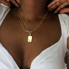 Your key to instant style. Our Willow layering set comes with a simple paperclip chain link necklace and engravable pendant necklace. We took care of the layering for you, now go rock the town. Dainty and minimal for everyday wear. Available in 14k gold plated or rhodium plated brass Willow Pendant: Size: 3/4" by 5/8"; Length: 18" cable chain with 2" extender Colette Necklace: Size: 5mm; Length: 18" elongated link paperclip chain with 2" extender Lobster claw closure With engraving this item is Minimalist Double Chain Paperclip Jewelry, Trendy Everyday Rectangular Pendant Jewelry, Trendy Everyday Charm Necklace With Paperclip Chain, Engraved Pendant, Layered Necklace Set, Jewelry Style, Necklace Size, Layered Necklace, Chain Link Necklace