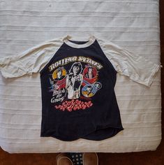 Authentic Early 80s Stones Shirt. The Artwork/Print Itself Is Beautiful And Remains In Amazing Condition. I Believe My Stepfather Wore This The Night Of The Concert And Never Again. I'm Listing It In 'Womens' For Now Because The Cut And Sizing Is Pretty Slight. However It's Clearly Unisex. Shirt Is Honestly In Amazing Condition, The Only Flaw Is What Appears To Be Small Rust Stain Around The Inner/Under Armpit Area. It Was Stored Well And Has No Smell Or Tears, It's Structurally Sound And I Have Vintage Screen Print Tops For Fall, Vintage Graphic Print Top For Spring, Vintage Screen Printed Tops For Fall, Spring Vintage Graphic Print Top, Vintage Red Shirt With Screen Print, Retro Crew Neck Shirt With Vintage Print, Vintage Red Shirt With Graphic Print, Band Merch Tops With Vintage Print And Short Sleeves, American Retro Cotton Tops For Spring