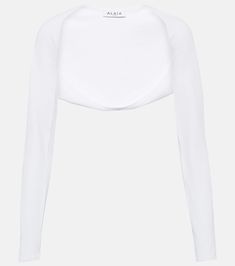 Knit Shrug in White - Alaia | Mytheresa White Evening Crop Top, Elegant Fitted Ribbed Crop Top, Elegant Ribbed Cropped Crop Top, Fitted Cropped Shrug For Layering, White Fitted Chic Crop Top, Fitted White Crop Top For Evening, Chic Cropped Shrug For Layering, Elegant White Stretch Crop Top, White Stretch Long Sleeve Shrug