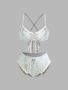 a woman wearing a white and blue floral print bikini set Criss Cross, Floral Lace, Lace Trim, Trim, Lace, Floral, Clothes