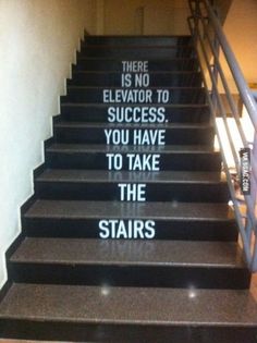 some stairs with the words there is no elevator to success you have to take the stairs