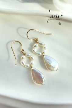 ✨ Dainty White Pearl Drop Earrings with 14K Gold/ Rose Gold Filled or Sterling Silver  • Simple & feminine pearl earrings with crafty touch. Perfect for both special occasions and everyday wear. A lovely gift & affordable treat for yourself 💖  • Handmade with genuine Freshwater Pearls and 14K gold-filled or Sterling Silver Wire. Teardrop 14k Gold-filled Pearl Earrings For Anniversary, Teardrop 14k Gold Filled Pearl Earrings For Anniversary, 14k Gold Filled Teardrop Pearl Earrings For Anniversary, Fine Jewelry Teardrop Pearl Earrings, 14k Gold Filled Teardrop Wedding Earrings, Elegant Handmade Pear-shaped Earrings, White Teardrop Fine Jewelry Earrings, 14k Gold Teardrop Pearl Earrings For Pierced Ears, 14k Gold Filled Drop Pearl Earrings