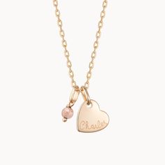 Our Personalized Mini Gemstone Heart Necklace is a touch of love for those that fill your heart with joy. The perfect personalized gift for a new mum, each necklace features a colorful gemstone to pair alongside a heart charm, hand-engraved with the name and birth date of their new arrival.&nbsp;Please note that there may be slight variations between each gemstone due to its origins.18K Champagne Gold Plated or 925 Sterling SilverMini Flat Heart: 0.4 x 0.4Mini Gemstone: 0.15 x 0.15 x 0.1Secure clasp fasteningCharms are removable from this chain and can be worn on all Merci Maman chain lengthsHand-engraved in our Paris workshopSent with love in a complimentary gift boxPlease note that necklaces that have several charms may develop a certain patina, giving it a unique style.Any slight va Sterling Silver Heart Charm Birthstone Necklace, Personalized Sterling Silver Birthstone Necklace With Heart Pendant, Sterling Silver Birthstone Necklace With Heart Charm And Pendant, Sterling Silver Birthstone Necklace With Heart Pendant And Charm, Heart Cut Birthstone Necklace For Keepsake, Sterling Silver Heart-shaped Birthstone Necklace, Personalized Pink Heart Pendant Jewelry, Pink Heart Pendant Jewelry For Personalized Gift, Dainty Heart Pendant Birthstone Charm Necklace