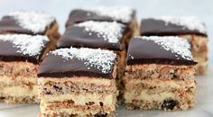 several pieces of cake with chocolate frosting and sprinkles