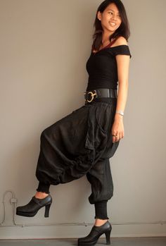 "Our new funky harem pants. A simple version for daily style! Made with super soft and comfy linen/cotton fabric. The fabric is flowy, has great stripe texture and semi-sheer. Elastic back waist. Drop-crotch harem pants style. Shirring cuff hem.gathered in small pleats around the waist to create volume. Special detail on the side with drawstring along the leg that you can adjust and get a different look. Big side pockets.The shirring hem allow you to wear the pants full length or Capri length. Y Trendy Baggy High Waist Harem Pants, Chic Cotton Harem Pants With Pockets, Trendy High Waist Cotton Harem Pants, Trendy Cotton Harem Pants With Elastic Waistband, Fitted Cotton Harem Pants, Trendy Baggy Harem Pants With Elastic Waistband, Trendy Baggy Wide Leg Harem Pants, Trendy Baggy Wide-leg Harem Pants, Cotton Harem Pants For Fall Festival