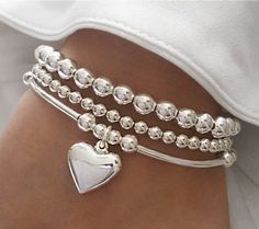 This Charm Bracelets item by KoochJewelry has 2558 favorites from Etsy shoppers. Ships from Canada. Listed on 07 Feb, 2023 Stacked Bracelets, Silver Heart Bracelet, Silver Bead Bracelet, Wrap Bracelets, Elegant Bracelet, Mens Jewelry Bracelet