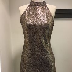 Sexy Little Gold And Black Halter Dress. Lots Of Stretch. No Zipper. New But Ripped Tags Out And Never Worn. Black Halter Mini Dress, Dresses Gold, Black Halter Dress, Clothing Black, Black Halter, One Clothing, Halter Mini Dress, Gold Dress, Clothing Dresses