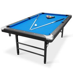 a blue pool table with two cues and a ball on the top, in front of a white background