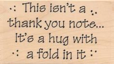 a wooden sign that says, this isn't a thank you note it's a hug with a fold in it