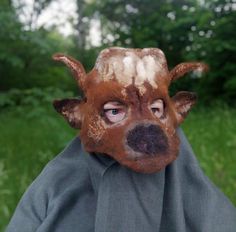 Original felted mask of a bull for lovers of reincarnation and fun. Unisex bull mask. The mask is made of Latvian wool and merino wool with the addition of viscose and linen fruits. The mask is made on a flat template, after which a three-dimensional 3D shape is offered to it. The mask is made by hand felting wool with water and soap. On the mask, I painted the muzzle of a bull using wool and linen. At the end of felting, I gave the mask the desired shape using natural gelatin. Therefore, the ma Bull Mask, Wolf Mask, Animal Mask, Carnival Mask, 3d Shape, Halloween Mask, Cosplay Halloween, Costume Mask, Animal Fashion