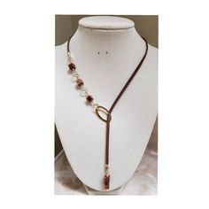 The faux suede cord is 14 inches long with one end of sand stones and gold tone jumps rings which is 4 inches long. The other end of the necklace has 3 sand stones on top of each other which is 1.3 inches long. 🤎Energy.Courage.Postivite Attitude🤎 Metal Dangle Lariat Necklace With Adjustable Length, Metal Lariat Necklace With Adjustable Length, Metal Lariat Choker Necklace With Adjustable Length, Adjustable Metal Lariat Necklace Choker, Adjustable Dangle Lariat Necklace, Adjustable Lariat Necklace With Natural Stones, Adjustable Choker Necklace With Gold Beads, Adjustable Gold Bead Choker Necklace, Adjustable Metal Lariat Necklace