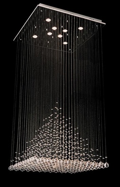 a chandelier hanging from the ceiling in a dark room