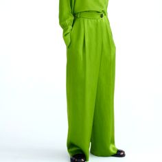 Blogger Favorite Sold-Out Statement Piece Wide Leg Flowy Pants With Pockets High Waisted Elegant Green Wide Leg Pants With Pockets, Elegant Green Bottoms With Pockets, Elegant Green Relaxed Fit Pants, Green Linen Wide Leg Pants For Work, Elegant Green Wide Leg Pants With Elastic Waistband, Elegant Green Trousers Pantsuit, Elegant Green High-waisted Pantsuit, Elegant Green Long Pants, Elegant Green Bottoms For Spring