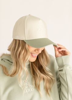 The God Works for the Good Trucker Hat is a classic "trucker" style hat with a reminder we all need from Romans 8:28. This adjustable hat is a one size fits all, with a cream crown and a light green brim. Wear it with your favorite casual outfits all year long! Style | Hats Color | Green Material | 100% Cotton Dimensions | 6.5" Height, 7" Brim Width Green Trucker Hat With Curved Brim, Casual Cream Cotton Trucker Hat, Trendy Green Cotton Trucker Hat, Cream Cotton Trucker Hat, Khaki Trucker Hat, One Size, Romans 8, Essential Dress, Church Dresses, Long Style