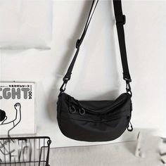 Modern Black Shoulder Bag With Zipper Pouch, Casual Black Shoulder Bag With Zipper Pouch, Gray Shoulder Bag With Zipper Closure For Outdoor, Black Nylon Shoulder Bag With Zipper Pocket, Gray Nylon Bags With Zipper Closure, Black Nylon Shoulder Bag For Mobile Phone, Everyday Nylon Shoulder Bag With Zipper Pouch, Gray Nylon Shoulder Bag With Zipper Closure, Black Nylon Shoulder Bag With Mobile Phone Pocket