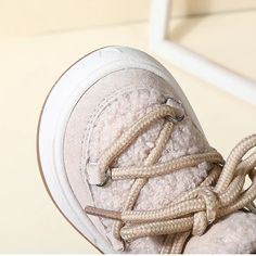 These Wool Laced Winter Rubber Sneakers will keep your little ones' feet warm and cozy all winter long! Made from lightweight rubber and lined with wool, these sneakers provide the perfect blend of comfort and style for any season. Stay one step ahead of the cold with these winter-ready shoes.