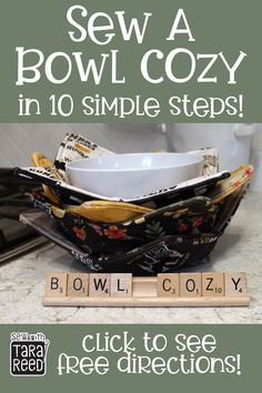 a bowl sitting on top of a counter next to scrabble letters