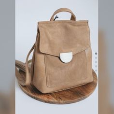 Convertible Backpack Can Be Worn As A Backpack Or A Purse. Multiple Ways To Wear This One. Sold Out Elsewhere Versatile Flap Backpack For Everyday Use, Versatile Beige Leather Backpack With Detachable Strap, Versatile Beige Backpack With Detachable Strap, Beige Backpack With Detachable Strap, Versatile Everyday Flap Satchel, Versatile Beige Leather Backpack With Adjustable Strap, Versatile Beige Leather Backpack, Everyday Chic Rectangular Backpack, Chic Everyday Rectangular Backpack