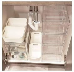 the drawers are organized with clear plastic containers