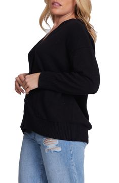 A wear-everywhere cardigan is knit in a slightly slouchy fit from a cashmere-kissed cotton blend. 26 1/2" length Front button closure V-neck Ribbed cuffs and hem 95% cotton, 5% cashmere Dry clean or hand wash, dry flat Imported Everyday Knit Cardigan, Black Knit Everyday Cardigan, Black Knit Cardigan For Everyday, Everyday Black Knit Cardigan, Black Cashmere Casual Cardigan, Casual Black Cashmere Cardigan, Fall V-neck Sweater For Everyday Wear, Everyday Fall V-neck Sweater, Oversized Black Cardigan